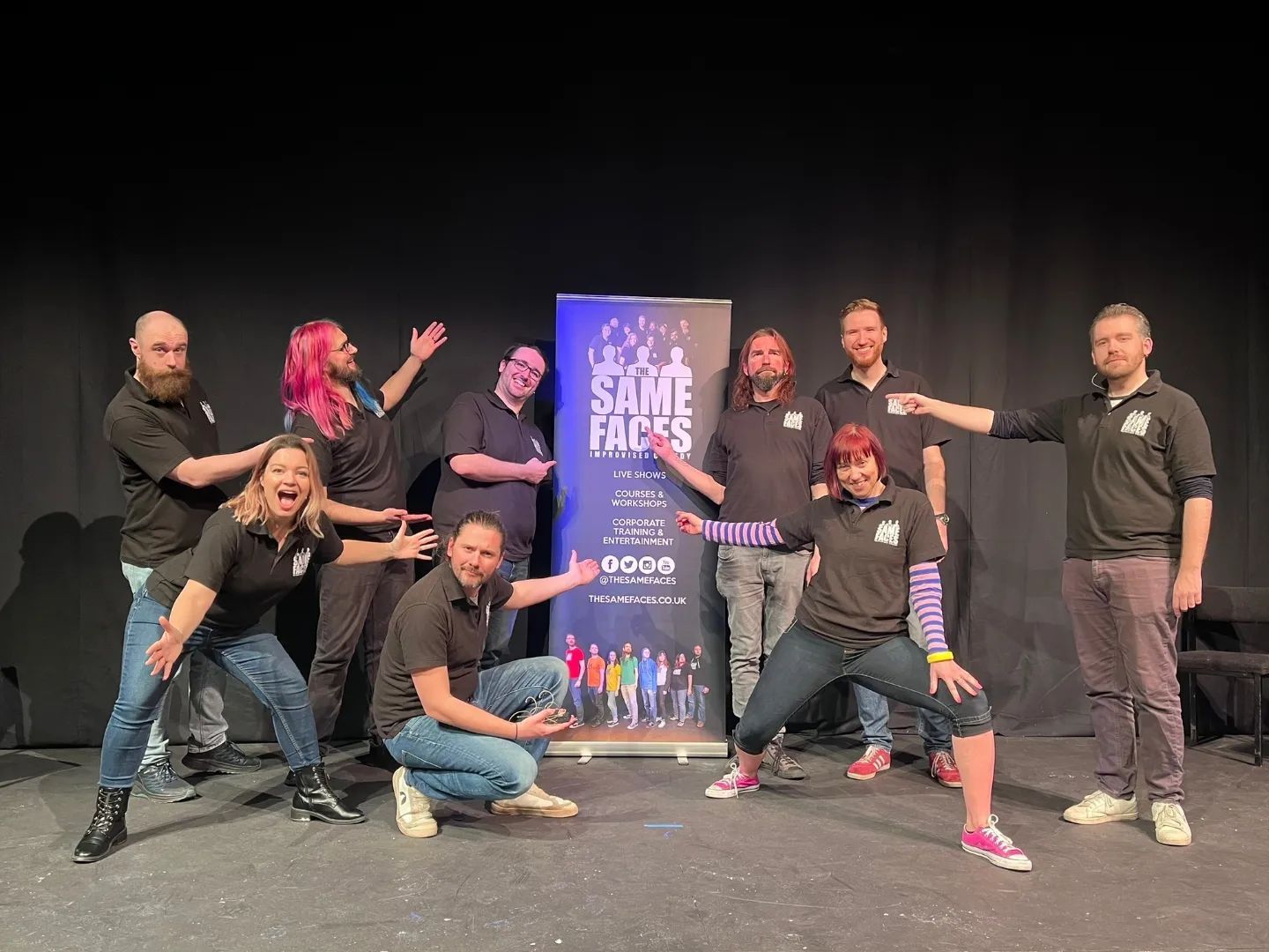 Improv comedians performing standup comedy on stage at a gig
