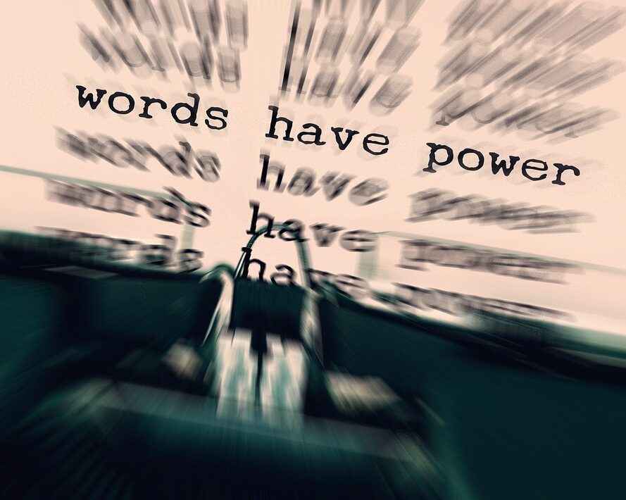 A typewriter has written the phrase "words have power".